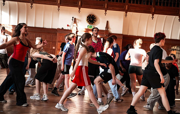 A group of NYMT actors rehearsing
