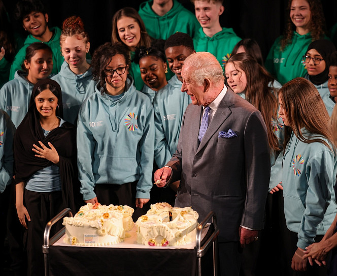 His Majesty The King cuts the birthday cake